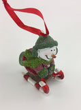 Skiing snowman hanging ornament